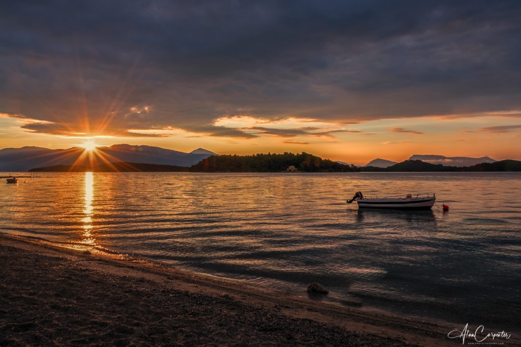 Sunrise behind the Princess islands from Nidri quayside